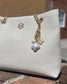 Jasmine Clover Bag Charm Worn Gold: Default