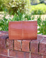 Cecilia Circle Logo Handbag Saddle EC: