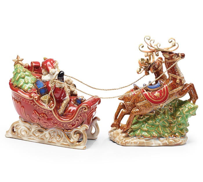 Two Piece Porcelain Santa In Sleigh Set