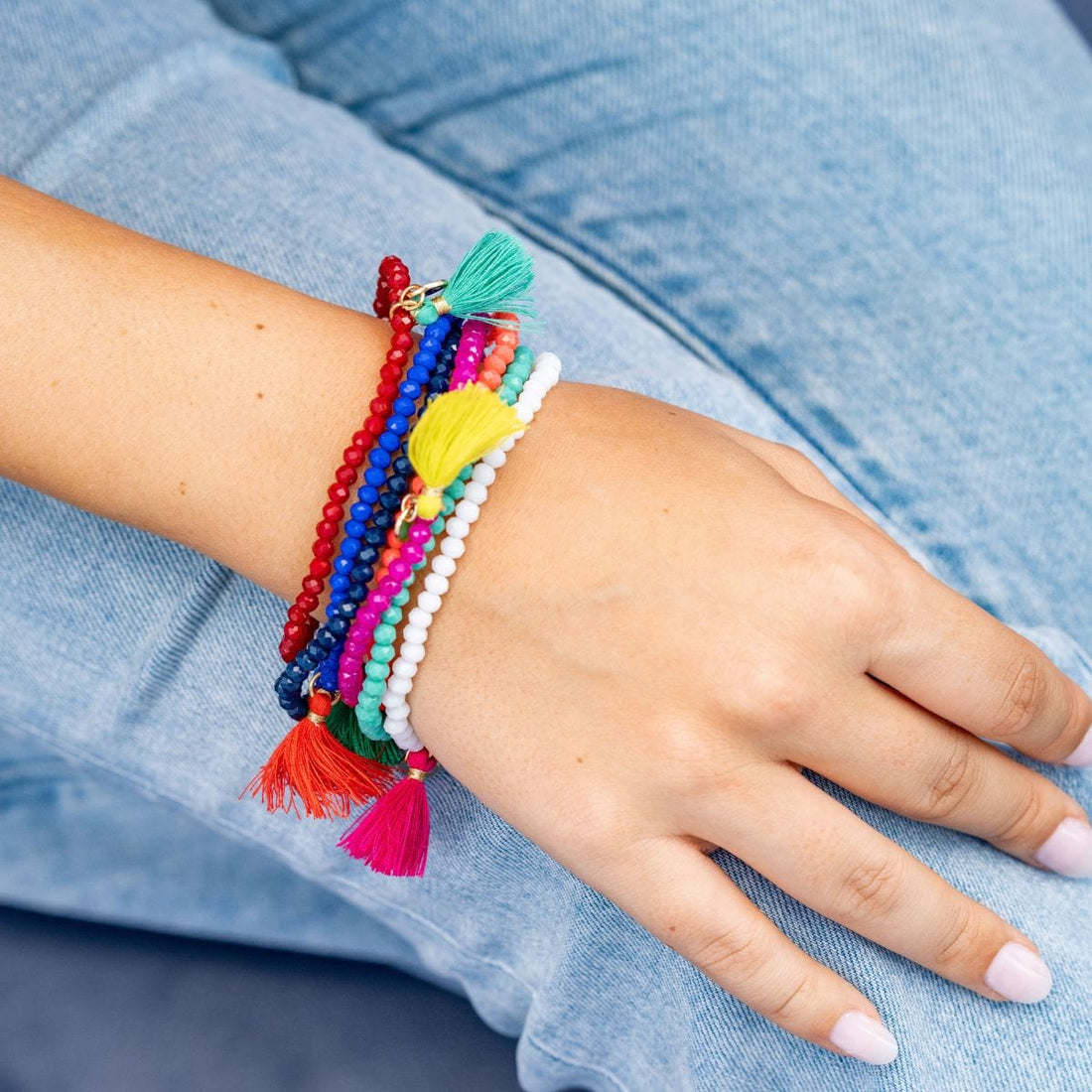 Patsy Solid Crystal Stretch Bracelet With Tassel Hot Pink